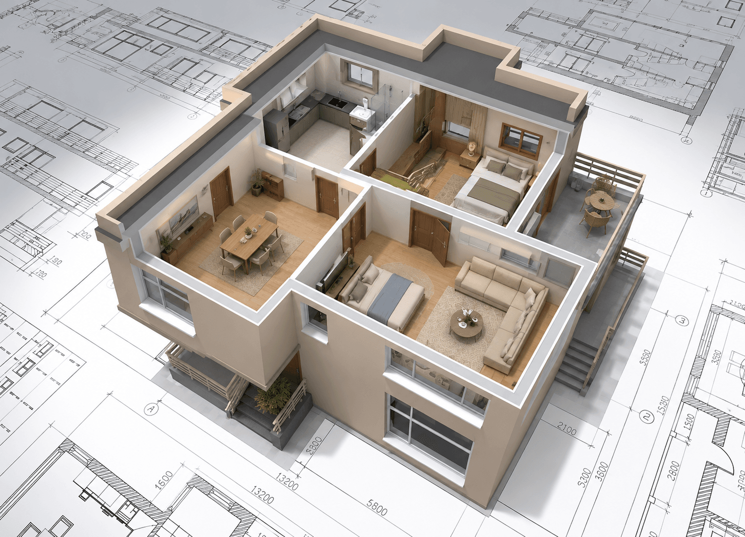 A stack of house plans on a wooden table